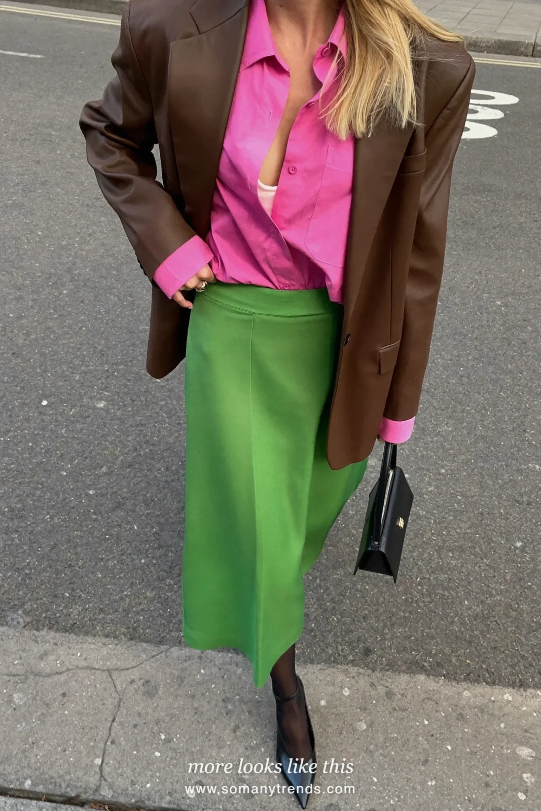 Woman in a chocolate brown blazer, bright pink button-down shirt, moss green midi skirt and black pumps, outfit 7