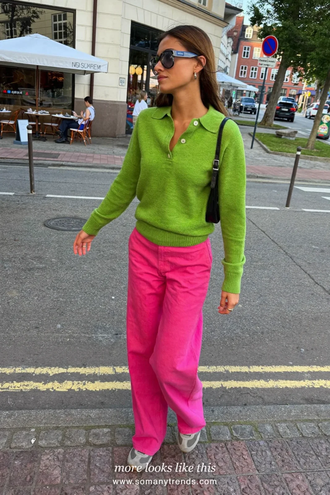 Woman in a moss green knit polo, bright pink wide-leg pants and gray sneakers, outfit 23